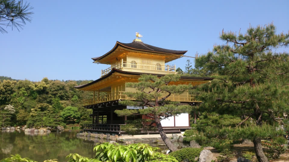 Kyoto After Dark Through The Gold Reflections Of Kinkakuji